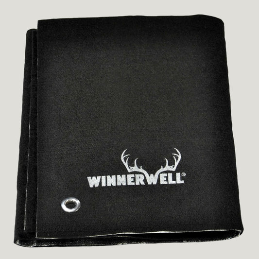 Folded winnerwell insulation mat for wood burning stoves
