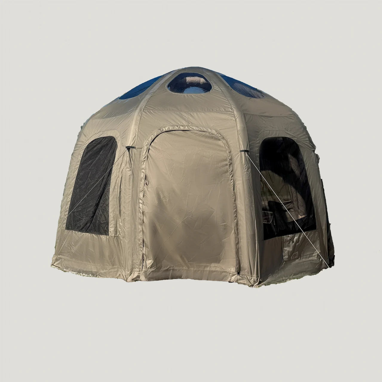 Beige and blue dome-shaped tent on a light gray background