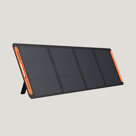 Foldable solar panel with orange accents on a white background