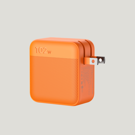 Orange power adapter with '102W' marking on a white background