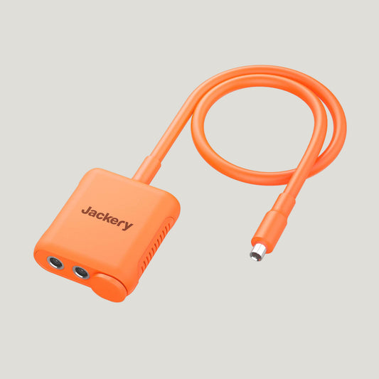 Orange cable adapter with 'Jackery' branding on a white background