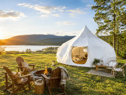 A glamping tent on scenic private land with a fire pit and outdoor seating set up as a Hipcamp listing