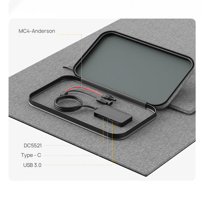Electrical components on a gray mat with text labels