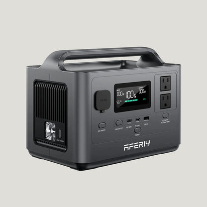 Portable power station with digital display and multiple outlets on a white background