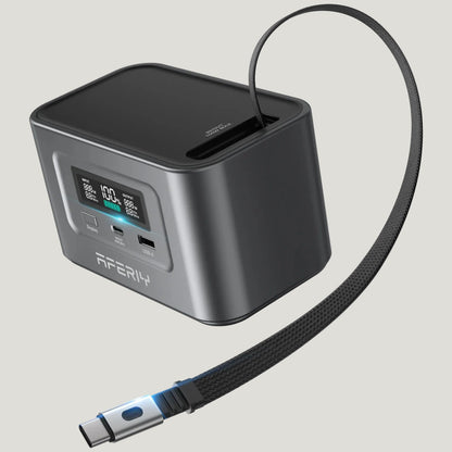 Black and silver power bank with digital display on a white background