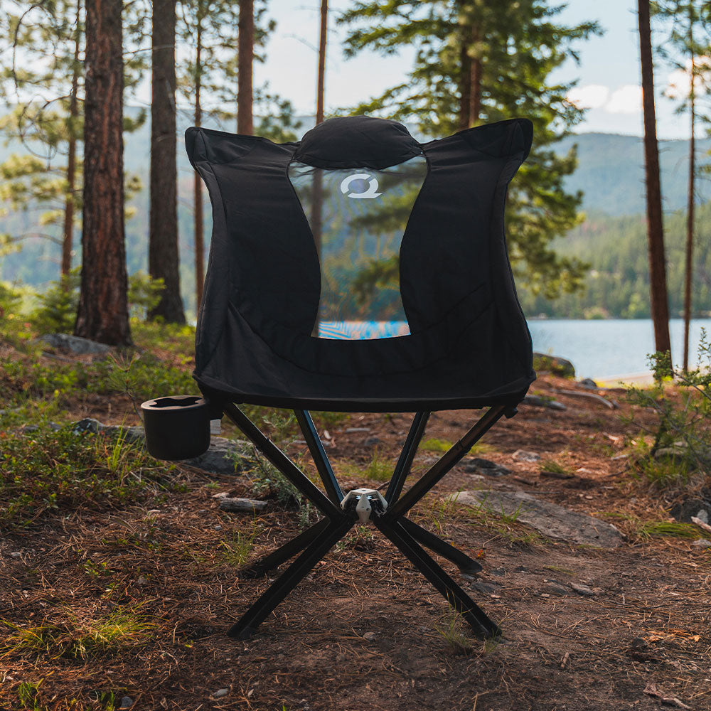 Relaxing in a black CLIQ EpiQ lounge chair outdoors