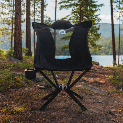 Relaxing in a black CLIQ EpiQ lounge chair outdoors