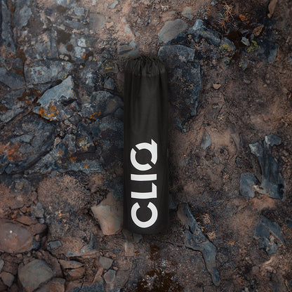 Black CLIQ EpiQ reclining chair at an outdoor gathering