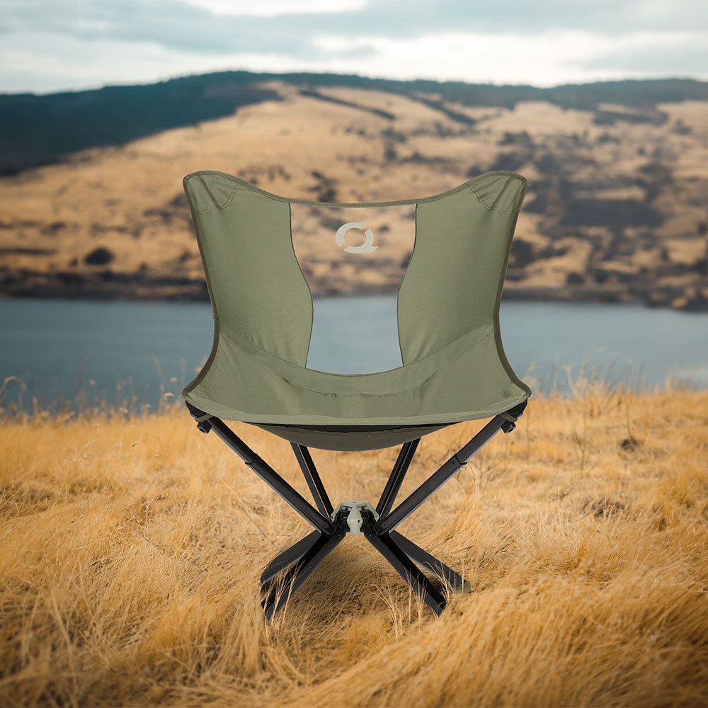 CLIQ MystiQ lounge chair in Burnt Olive at an outdoor gathering