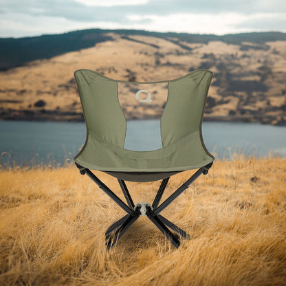 CLIQ MystiQ lounge chair in Burnt Olive at an outdoor gathering
