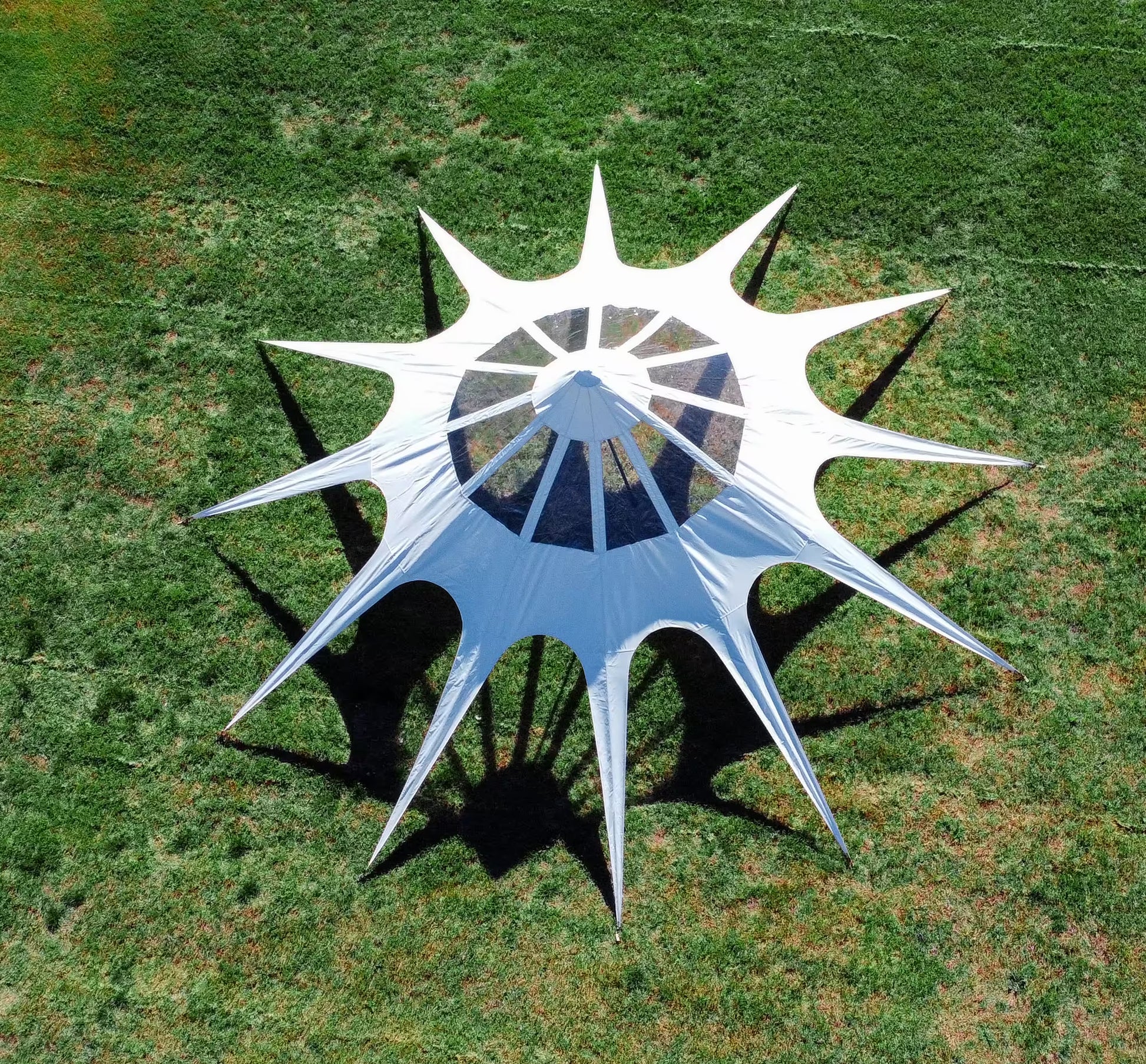 Star-shaped outdoor canopy on grass