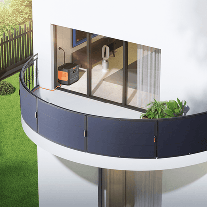 Balcony with curved glass railing, green grass, and a white wall.