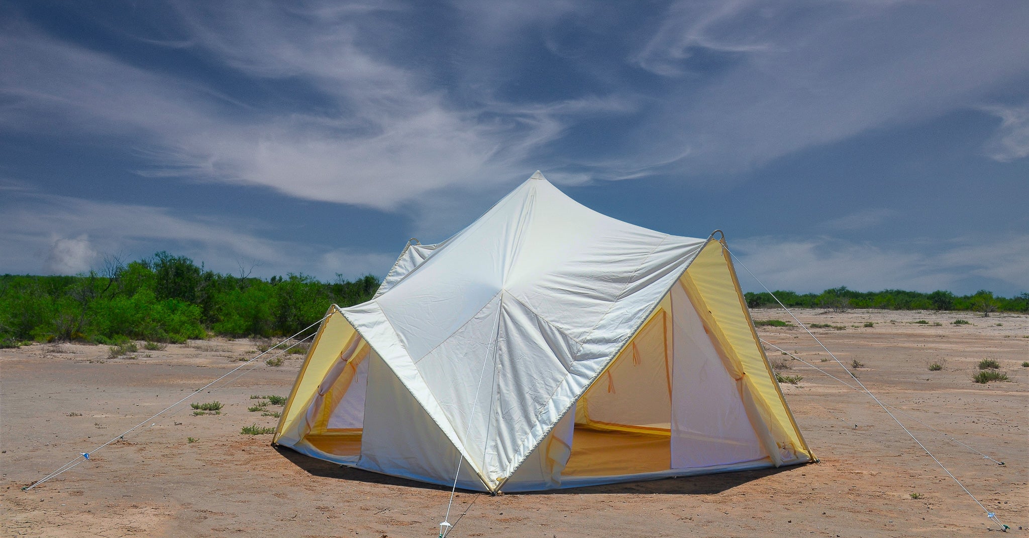 Load video: Timelapse video of the pyramid tent being set up by the wilderness resource team.