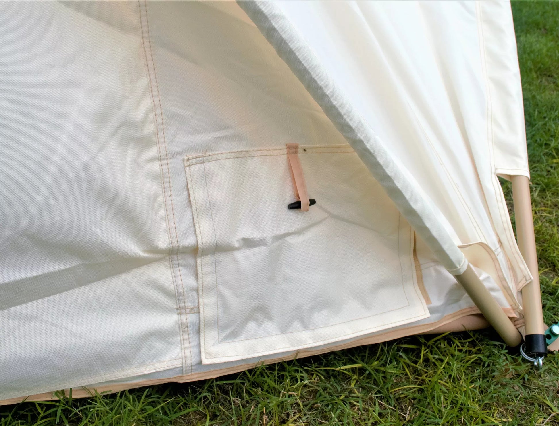 Pyramid tent's ingenious duct inlet: seamlessly run extension cords or channel your AC exhaust for ultimate comfort